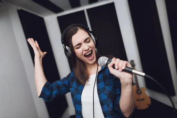 depositphotos_186679792-stock-photo-girl-sings-her-song-modern