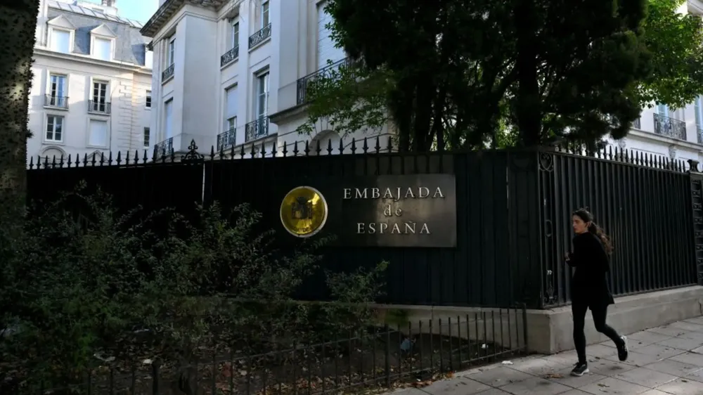 española